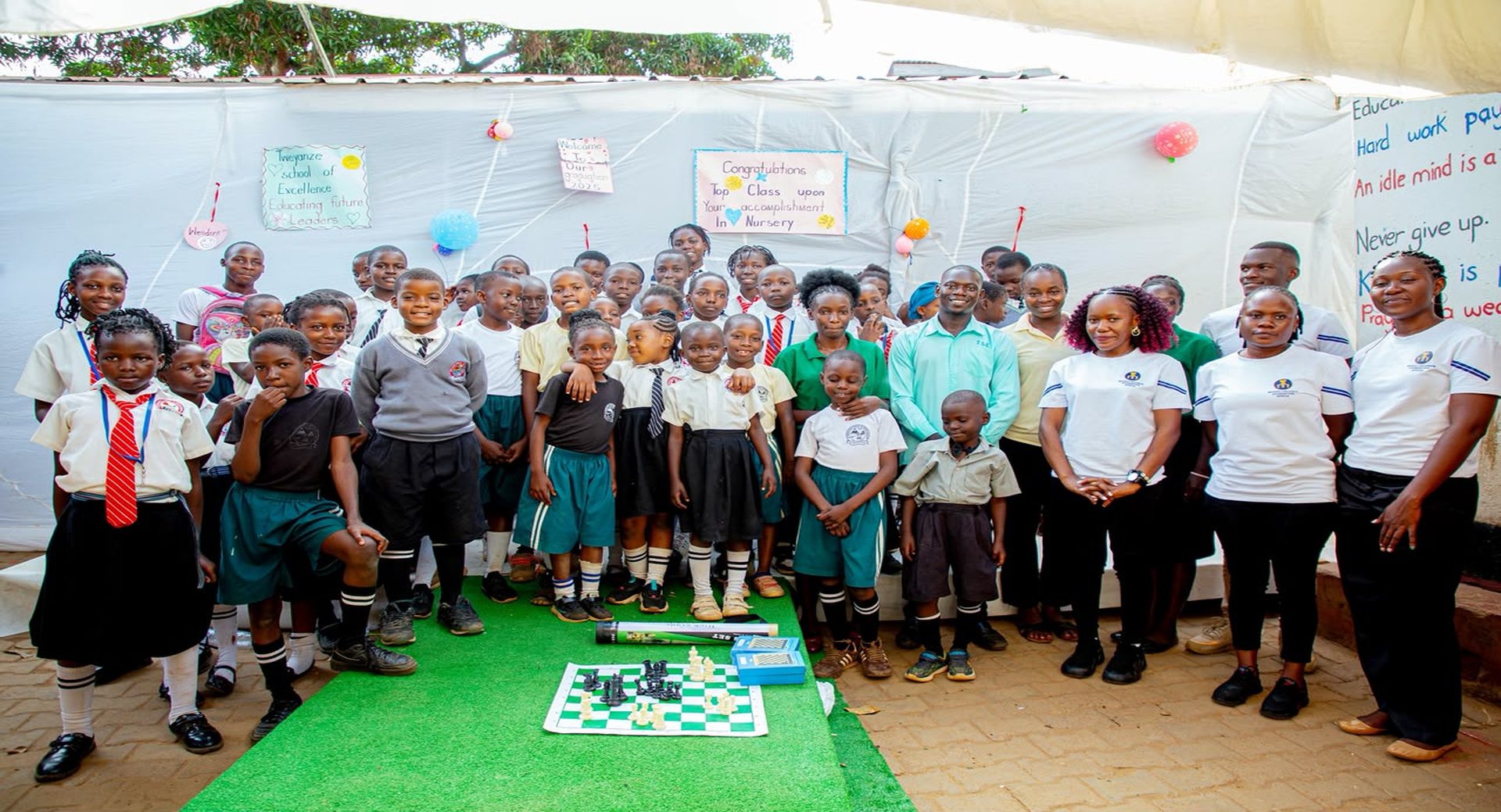 Children and foundation staff at a school event